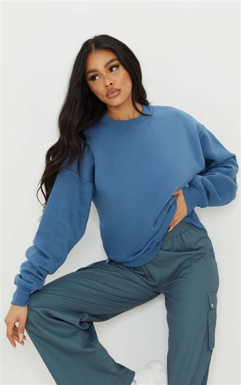 Stay Cozy & Chic with Our Dusty Blue Sweatshirt